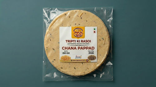 Homemade Chana daal papad sealed in transparent pouch packing ready to fry