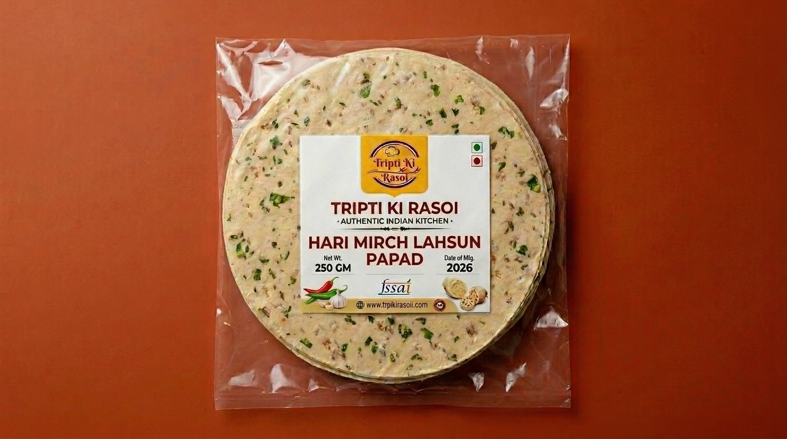 Homemade Hari Mirch Lahsun papad sealed in transparent pouch packing ready to fry