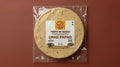 Homemade Urad papad sealed in transparent pouch packing ready to fry